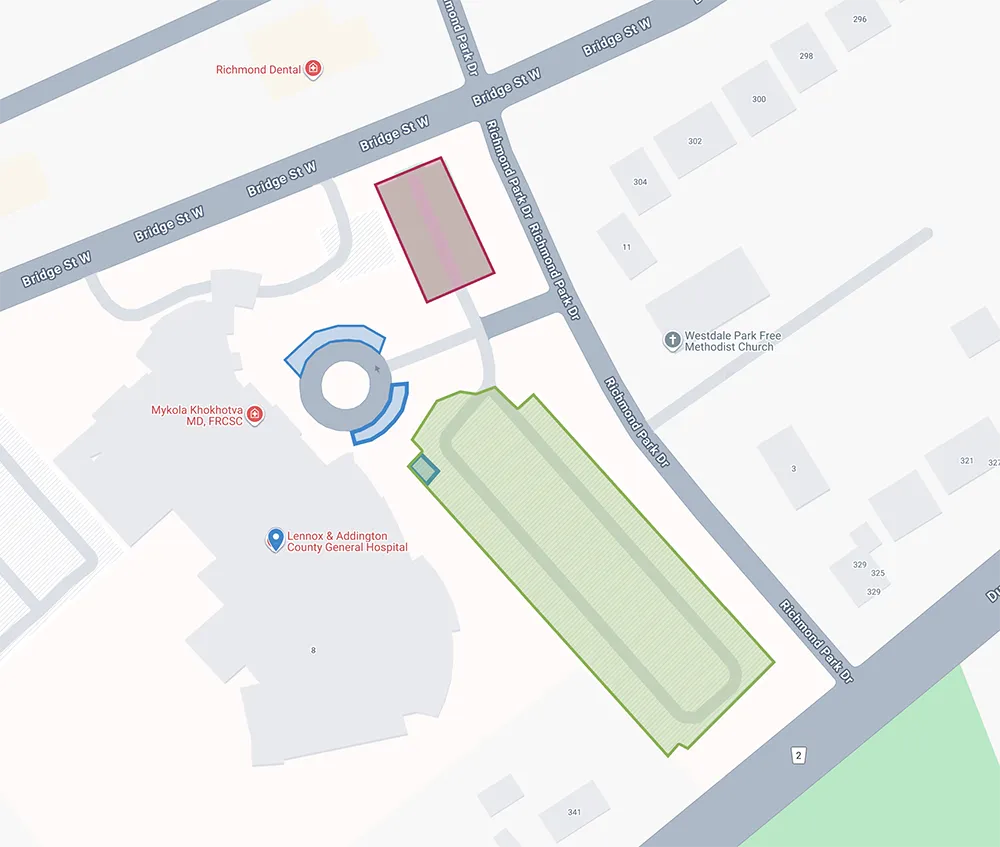 Map showing the Lennox and Addington County General Hospital site with surrounding streets, nearby buildings, and highlighted areas indicating different parking zones.