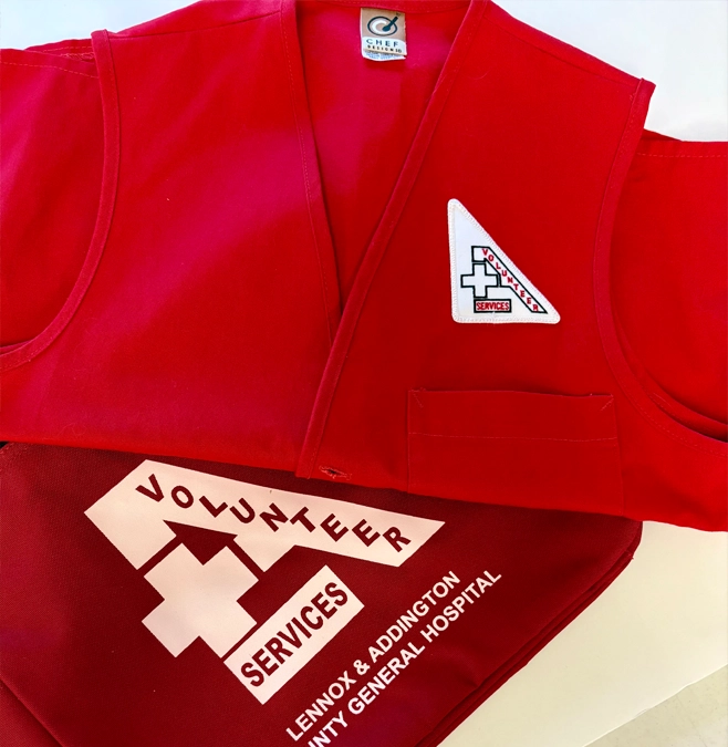 Red Lennox and Addington County General Hospital volunteer services vest.