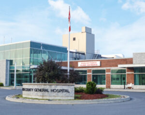 Exterior view of Lennox and Addington County General Hospital showing the main clinic entrance and signage.
